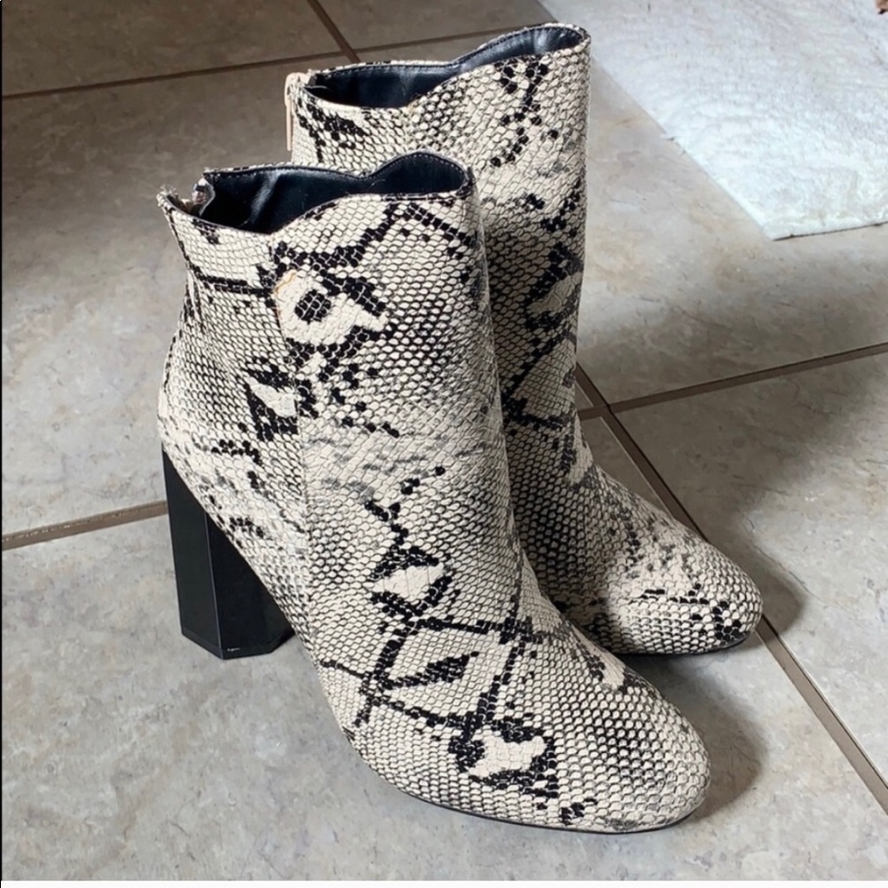 Women’s snake skin heel boots
